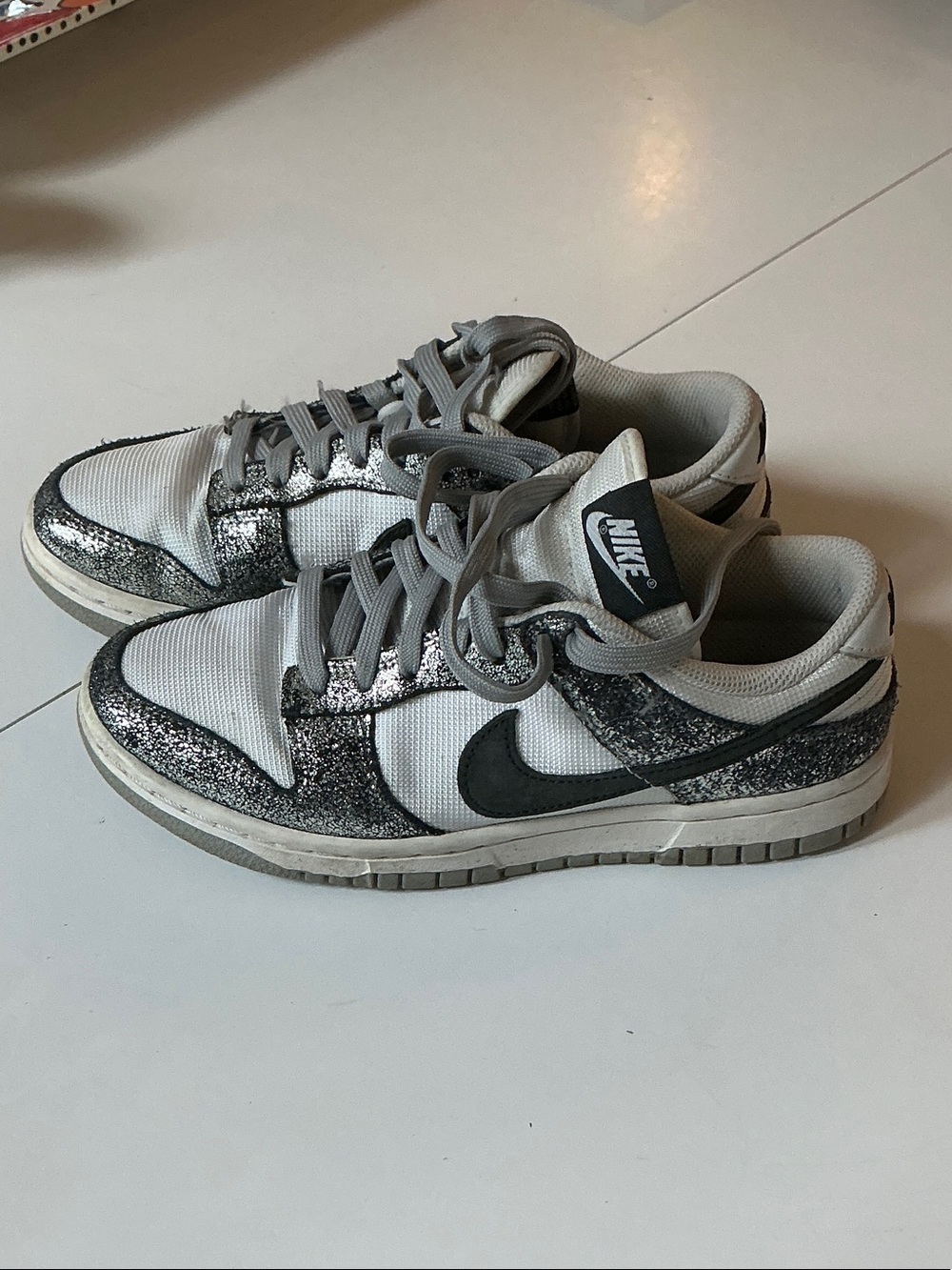 Nike Women's White & Gray Low-Top Sneakers with Black Swoosh
